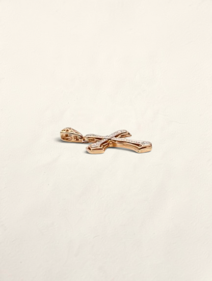 Zafrah 10k yellow gold cross pendant featuring 44 round diamonds set in a polished gold frame.