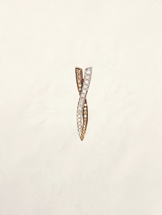 Zafrah 14K two-tone gold pendant featuring a crossed design with pavé-set chocolate and white diamonds.