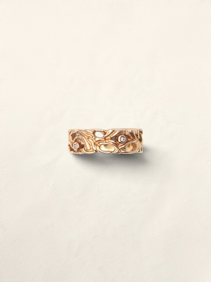 Zafrah 14K yellow gold filigree ring featuring five bezel-set round diamonds in an intricate openwork design.