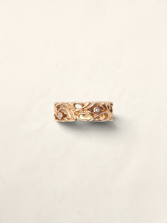 Zafrah 14K yellow gold filigree ring featuring five bezel-set round diamonds in an intricate openwork design.