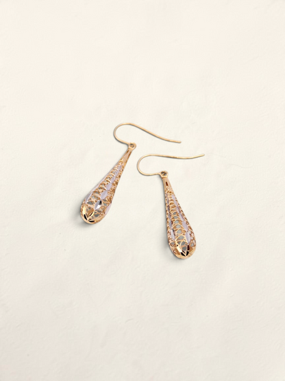 Zafrah 14K two-tone gold dropdown earrings featuring an intricate lattice design on a light background.