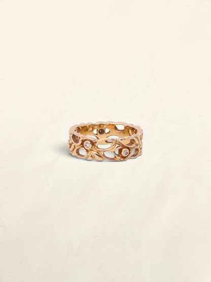 Zafrah 14K yellow gold filigree ring featuring five round bezel-set diamonds in an intricate openwork band design