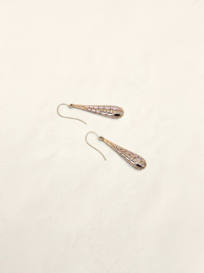 Zafrah 14K two-tone gold dropdown earrings featuring an intricate lattice design on a light background