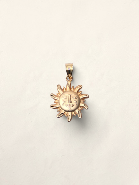 Zafrah 14K yellow gold sun face pendant with a polished finish and detailed celestial design