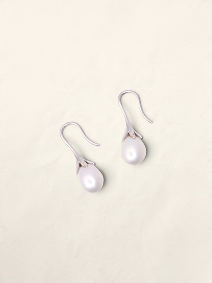 Zafrah 14k white gold drop earrings featuring elegant teardrop-shaped cultured pearls on curved hooks