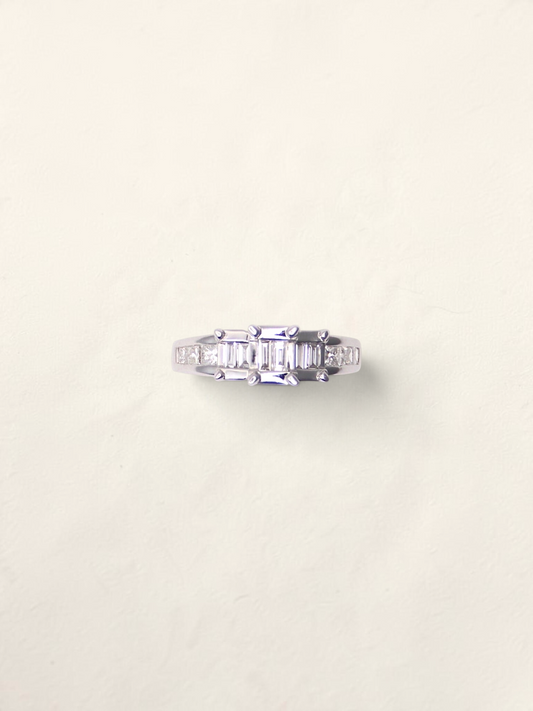 Zafrah 14K white gold ring featuring emerald and princess cut diamonds in a channel setting