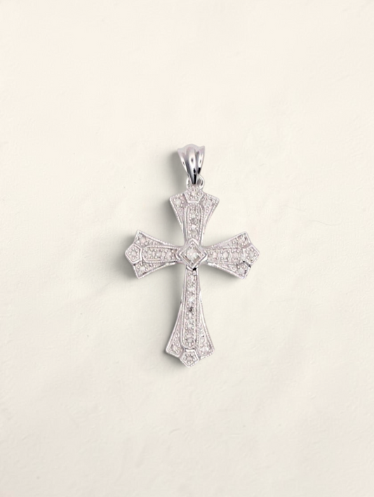 Zafrah 10k white gold cross pendant featuring 0.31ctw round diamonds in an ornate, detailed design.