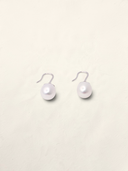 Zafrah 14K white gold drop earrings featuring lustrous white cultured pearls on elegant curved hooks