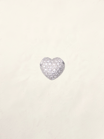 Zafrah 18K white gold heart pendant featuring a sparkling pavé diamond setting on a neutral background.