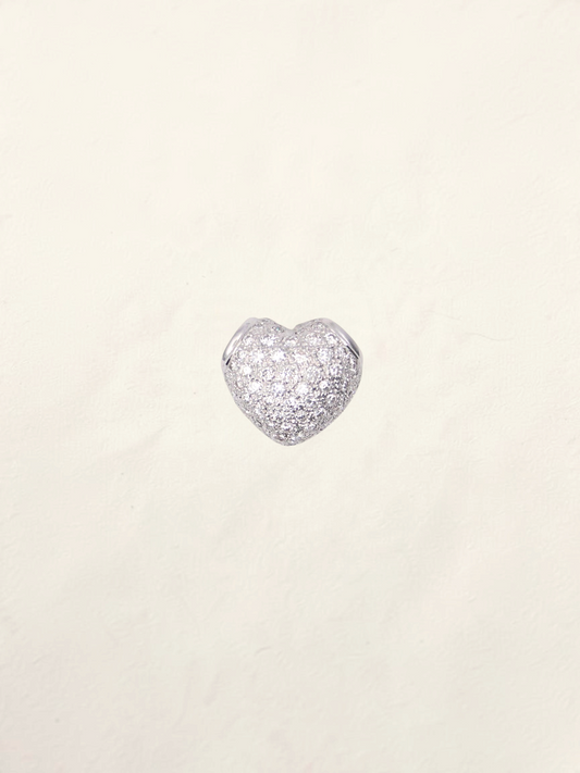 Zafrah 18K white gold heart pendant featuring a sparkling pavé diamond setting on a neutral background.