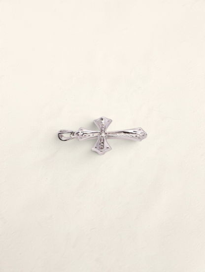 Zafrah 10k white gold cross pendant featuring 0.31ctw round diamonds on a polished metallic surface.