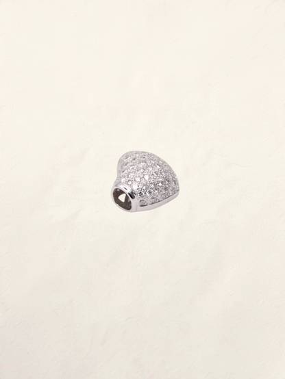 Zafrah 18K white gold heart pendant featuring a sparkling pavé diamond setting on a neutral background.
