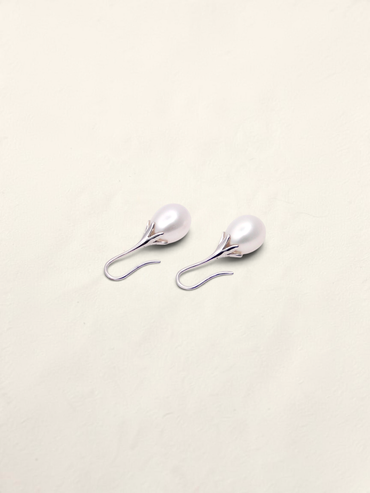 Zafrah 14K white gold drop earrings featuring elegant cultured pearls in a delicate prong setting