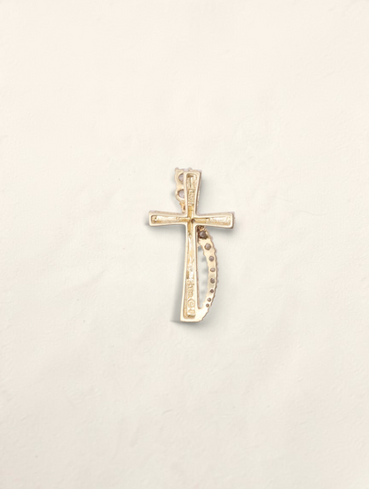 Zafrah 10k yellow gold cross pendant featuring graduated round diamonds totaling 0.21ctw on a white background.
