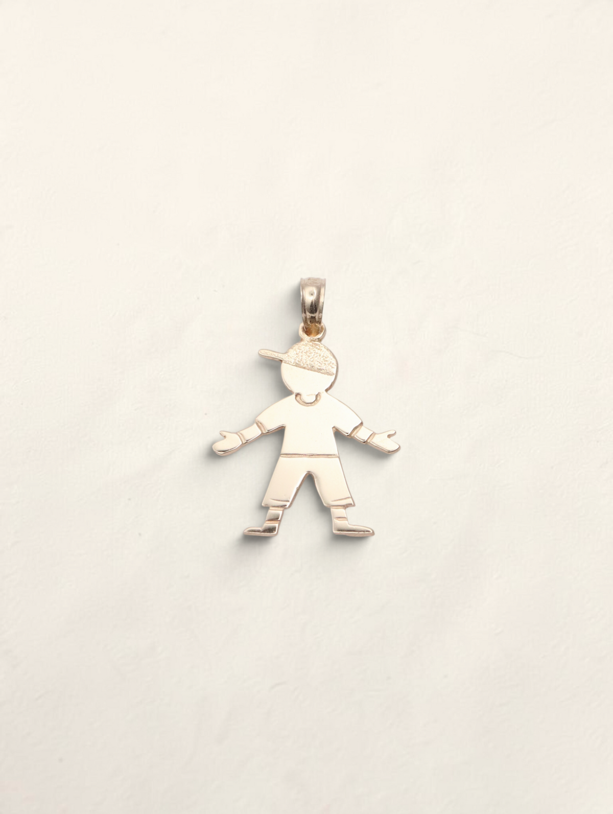 Zafrah 14K yellow gold boy pendant featuring a stylized figure wearing a cap on a simple bail