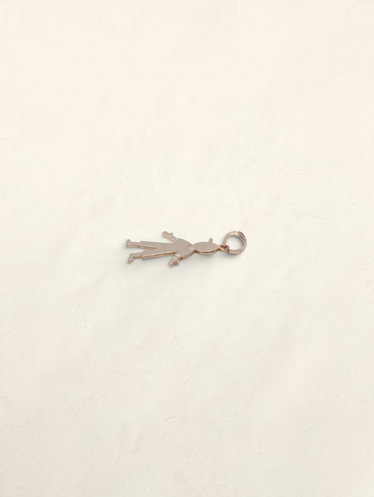 Zafrah 14K yellow gold boy pendant charm with a polished finish, shown from a side angle on a white background.