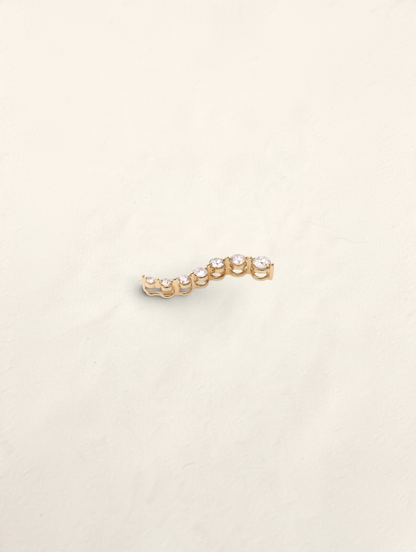 Zafrah 14K yellow gold curved journey pendant featuring seven graduated round diamonds totaling 0.5ctw
