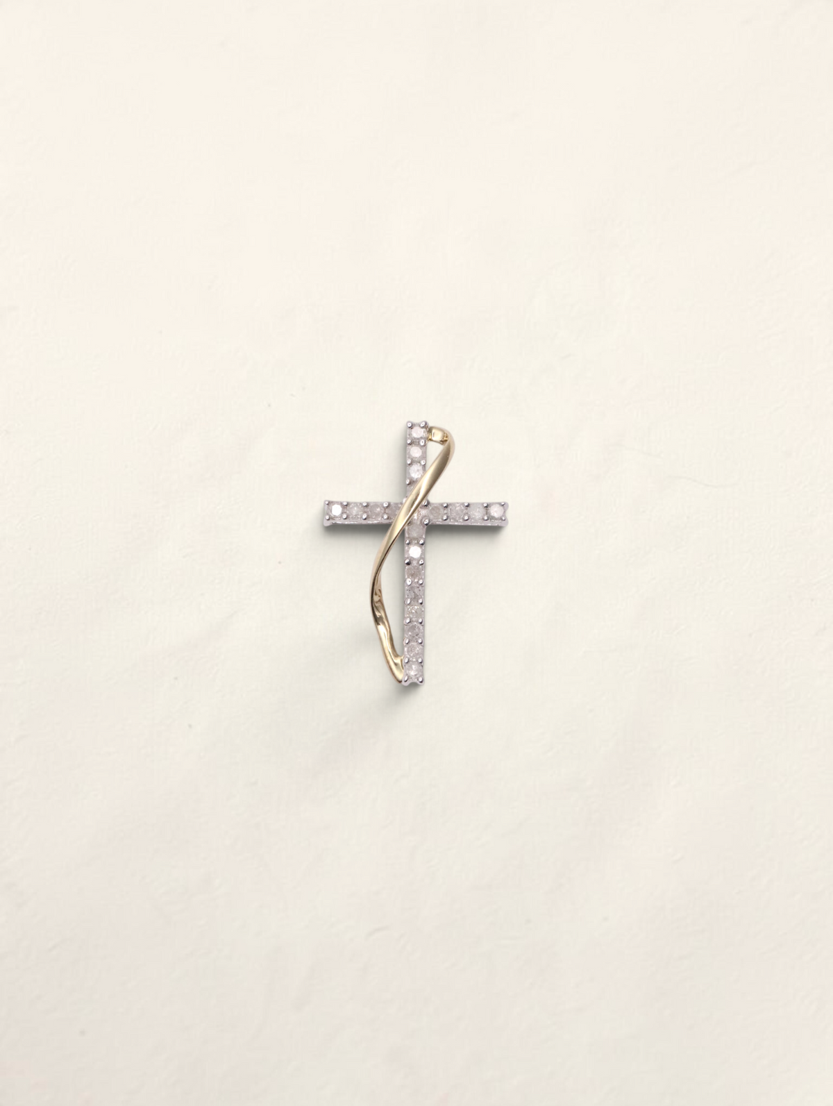 Zafrah 10K two-tone gold small cross pendant featuring 0.2ctw round diamonds in a delicate intertwined design.