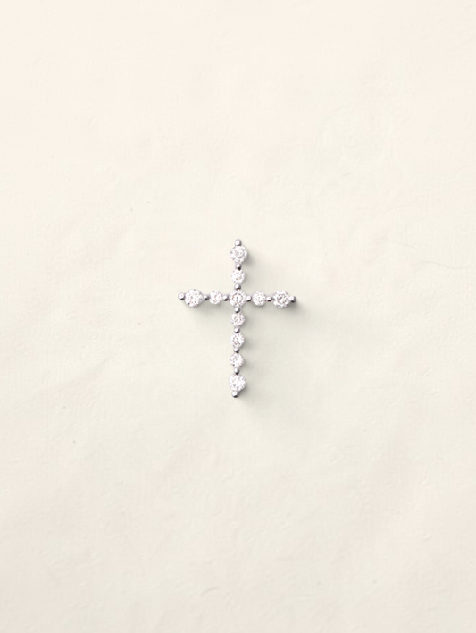 Zafrah 10k white gold cross pendant featuring 11 round diamonds totaling 0.16ctw on a minimalist setting